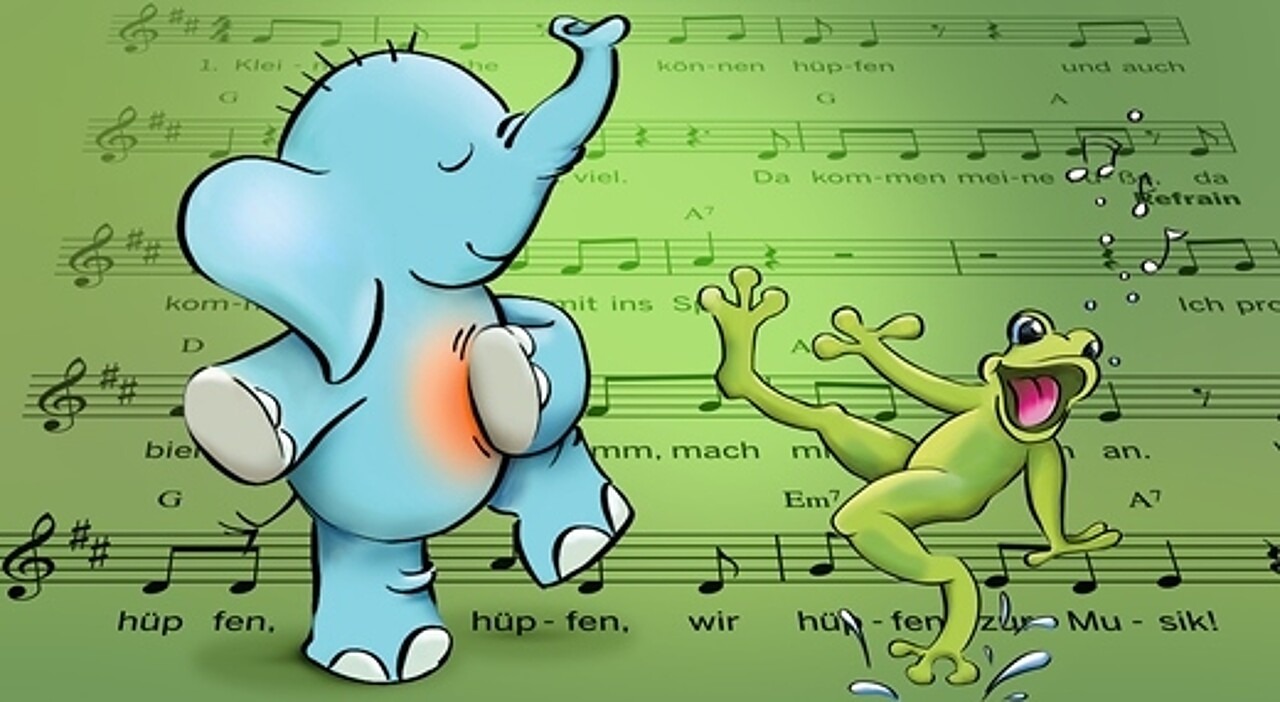 Ein Elefant und ein Frosch tanzen auf den Noten eines der starken Mitmach-Lieder.